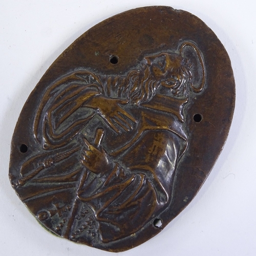 287 - A relief cast patinated bronze plaque depicting a saint, unsigned, height 8.5cm