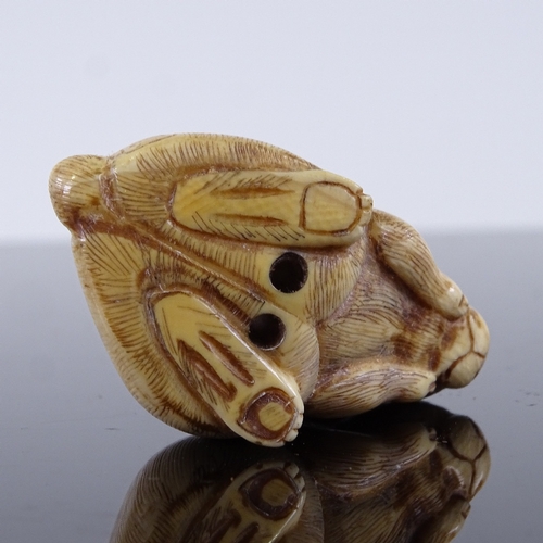 297 - A Japanese carved ivory hare netsuke, Meiji Period, height 3cm