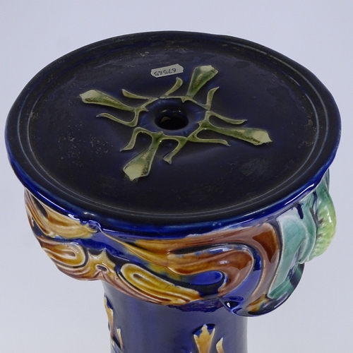 312 - A Majolica blue/brown glaze jardiniere on pedestal, stamped Etruscan, height 96cm, diameter 26cm