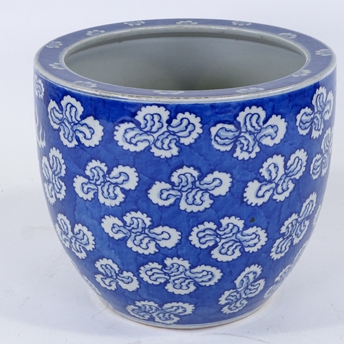 316 - A Chinese blue and white transfer decorated jardiniere, with dragon design, height 23cm, diameter 27... 