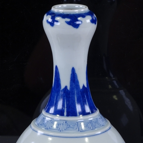 325 - A Chinese blue and white porcelain vase, with painted court scenes, height 25cm