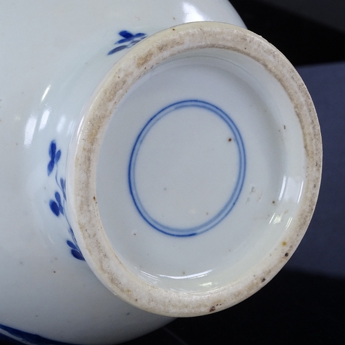 325 - A Chinese blue and white porcelain vase, with painted court scenes, height 25cm