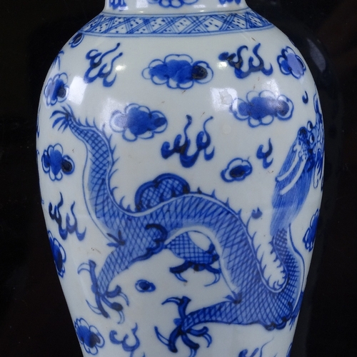 328 - A Chinese blue and white porcelain dragon design vase, hand painted decoration, height 25cm