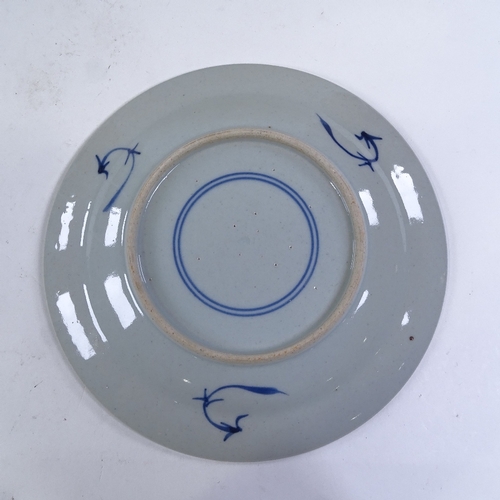 329 - A Chinese blue and white porcelain plate, with painted Buddha design, diameter 21cm