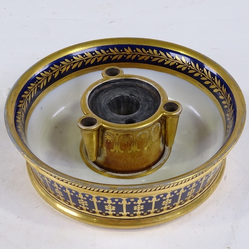 331 - A Sevres porcelain blue and gilt decorated ink stand, late 19th century, diameter 13cm