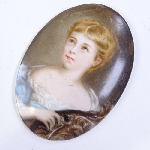 349 - A 19th century Continental painted porcelain plaque, portrait of a child, 12.5cm x 9cm