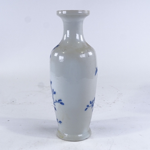 356 - A Chinese blue and white porcelain vase, with hand painted butterflies birds and flowers, 6 characte... 