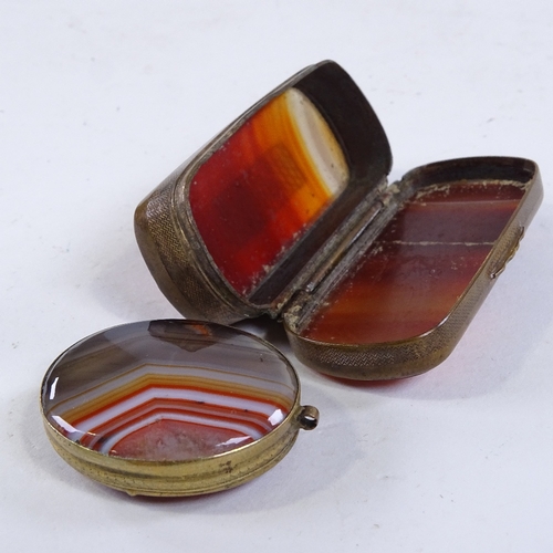 364 - A 19th century agate and brass snuffbox, length 6cm, and an agate and brass locket (2)