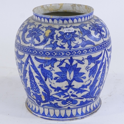 370 - A 19th century Indian blue and white ceramic vase, with geometric decoration, height 27cm (A/F)