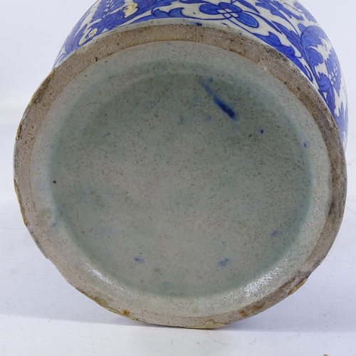 370 - A 19th century Indian blue and white ceramic vase, with geometric decoration, height 27cm (A/F)