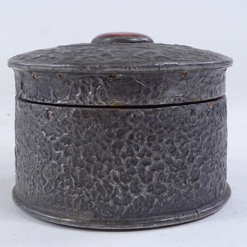 387 - An Arts and Crafts pewter covered circular box, with inset Ruskin porcelain plaque, diameter 8.5cm