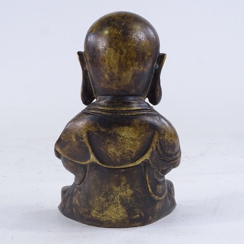 388 - A Chinese bronze seated Buddha, height 20cm