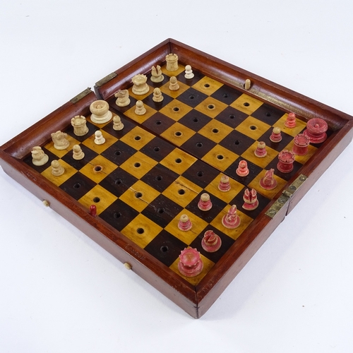 64 - A Jaques of London mahogany travelling chess set, mahogany-cased with rosewood and boxwood board, an... 