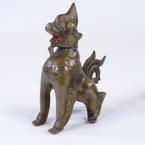 71 - A Burmese 19th century bronze lion, circa 1800-1850, height 14.5cm, and 2 Syrian brass and coloured ... 