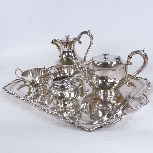 74 - A Walker & Hall electroplate tea tray, and a James Dixon & Sons 4-piece plated tea set