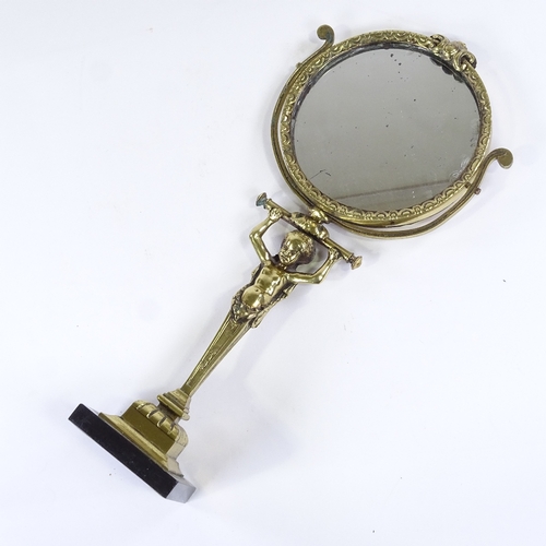 76 - A 19th century bronze-framed circular shaving mirror supported by a Classical figure, height 44cm