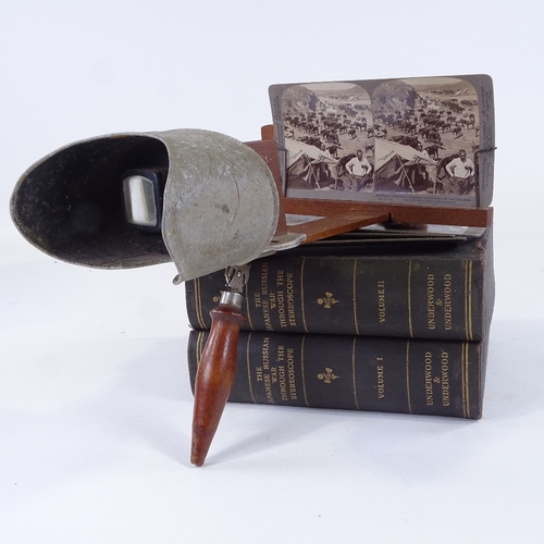 83 - A 19th century stereoscopic card viewer, together with a bound set of cards depicting the Japanese R... 