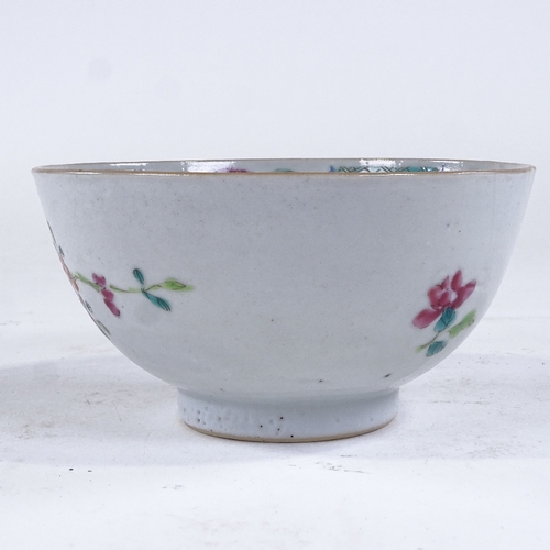 84 - A Chinese 18th century porcelain bowl with painted enamel flowers, diameter 11cm