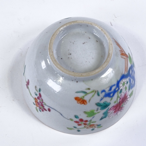 84 - A Chinese 18th century porcelain bowl with painted enamel flowers, diameter 11cm