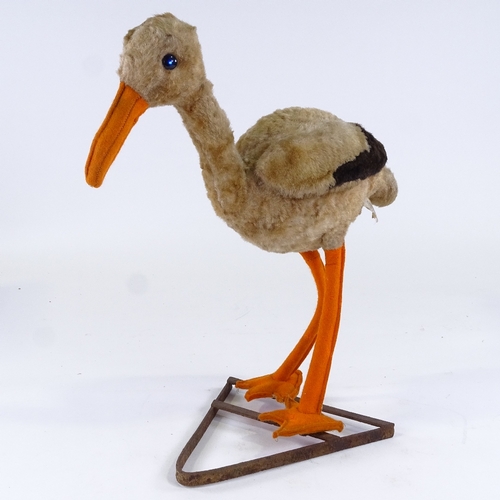 90 - A rare Chiltern Toys stork/crane on original metal stand, 2 original labels, height 40cm