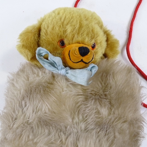 91 - A Merrythought Cheeky Bear hand warmer, with bell inside and original label, length 32cm