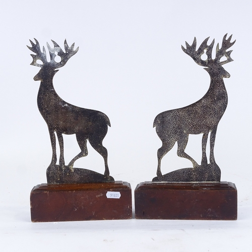 405 - A pair of Victorian brass stag design doorstops on wooden plinth bases, height 33cm