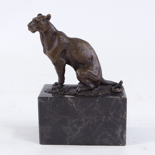 417 - L Garvin, patinated bronze seated lioness on marble base, height 18cm