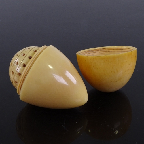 423 - A 19th century ivory egg-shaped wig powderer, length 5.5cm