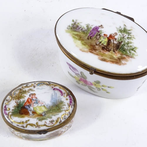 437 - 2 small Continental porcelain oval boxes, with gilt-metal mounts, hand painted decoration