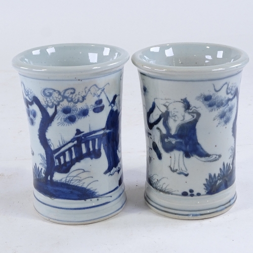 440 - A pair of Chinese blue and white porcelain vases, coil made pots with hand painted scenes, height 14... 