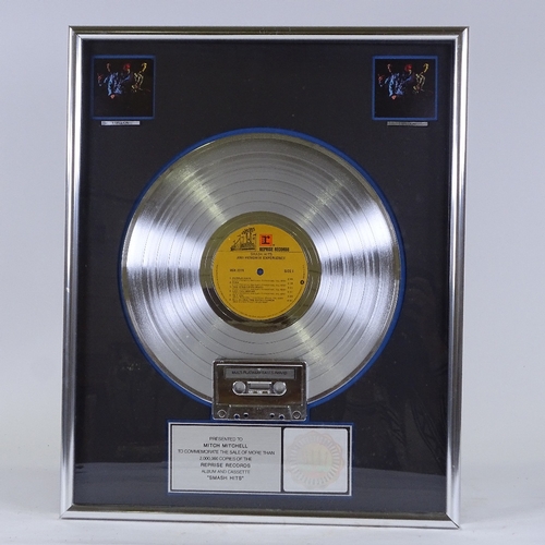 448 - The Jimi Hendrix Experience, multi-platinum disc, presented to Mitch Mitchell (drummer) to commemora... 