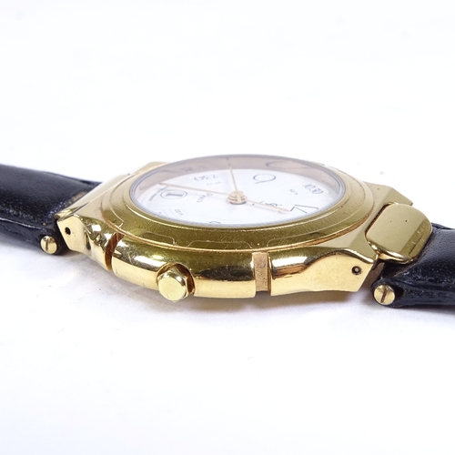 475 - YSL YVES SAINT LAURENT - a mid-size gold plated stainless steel Paris quartz wristwatch, silvered di... 