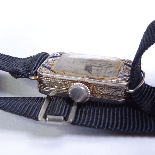 480 - A lady's Art Deco platinum? sapphire and diamond cocktail wristwatch, retailed by Walser Wald, silve... 