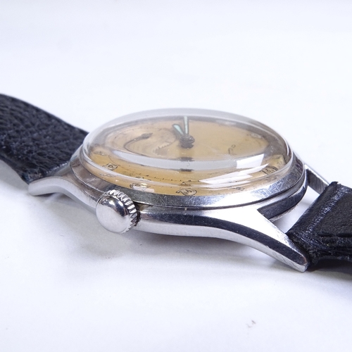 481 - TISSOT - a Vintage stainless steel Bumper automatic wristwatch, ref. 6536-1, champagne dial with Ara... 