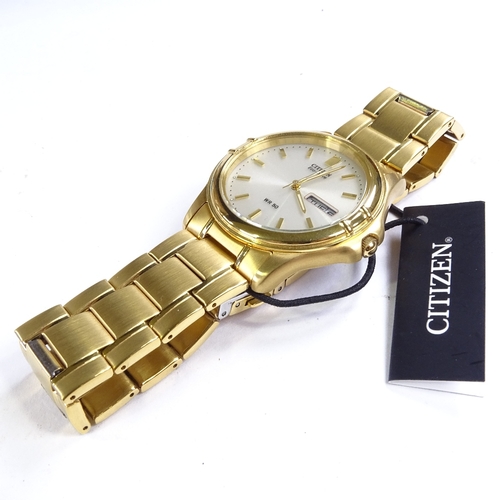 522 - CITIZEN - a gold plated stainless steel Eco-Drive WR50 quartz wristwatch, ref. E101-8034957, silvere... 