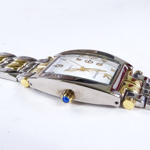 531 - KRUG-BAUMEN - a 2-tone gold plated stainless steel Tuxedo quartz wristwatch, ref. 1963KM, white dial... 