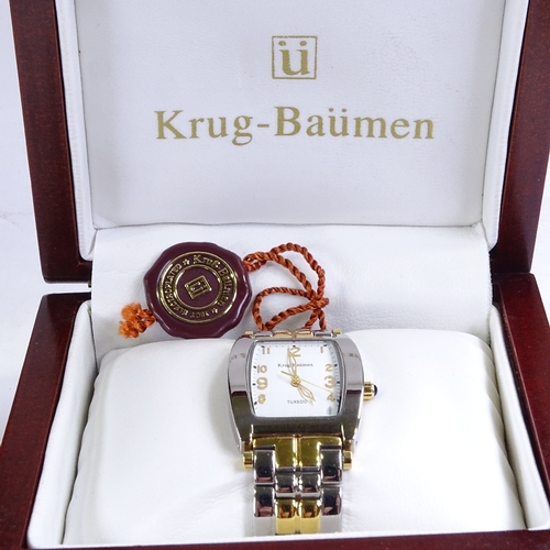 531 - KRUG-BAUMEN - a 2-tone gold plated stainless steel Tuxedo quartz wristwatch, ref. 1963KM, white dial... 