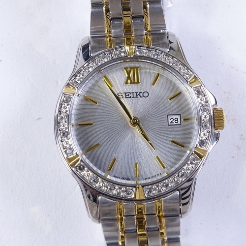 SEIKO - a lady's 2-tone gold plated stainless steel quartz wristwatch, ref.  6N22-00G0, spiral silver
