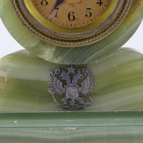 538 - A small Russian green onyx barrel-shaped mantel clock, printed dial with Arabic numerals and applied... 