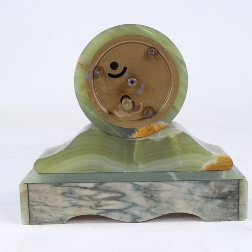 538 - A small Russian green onyx barrel-shaped mantel clock, printed dial with Arabic numerals and applied... 