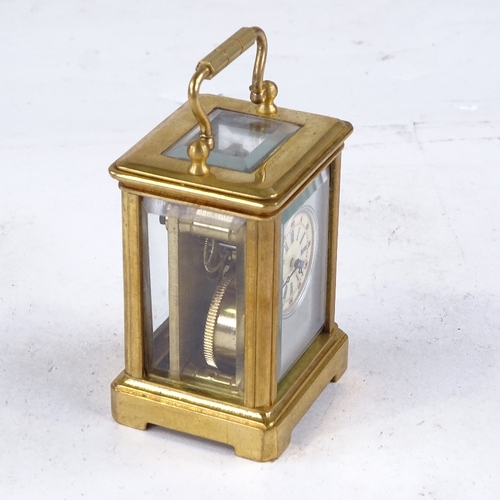 541 - A miniature brass-cased carriage clock, printed dial with Roman numeral hour markers and silvered su... 