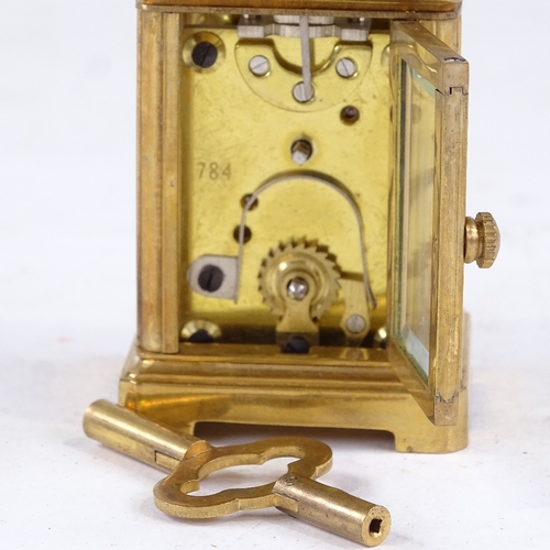 541 - A miniature brass-cased carriage clock, printed dial with Roman numeral hour markers and silvered su... 