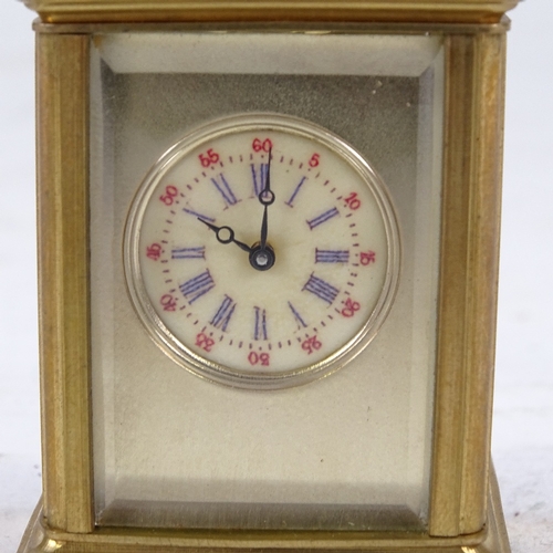 544 - A miniature brass-cased carriage clock, printed dial with Roman numeral hour markers and silvered su... 