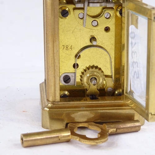 544 - A miniature brass-cased carriage clock, printed dial with Roman numeral hour markers and silvered su... 