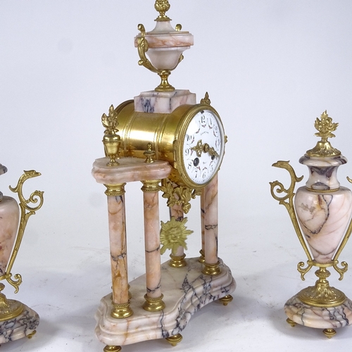 549 - A French Empire style veined pink marble and brass-mounted 8-day 3-piece clock garniture, by Courtie... 