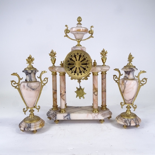 549 - A French Empire style veined pink marble and brass-mounted 8-day 3-piece clock garniture, by Courtie... 