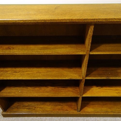 116 - A solid oak double-fronted open library bookcase, length 183cm (6'), height 122cm (4')