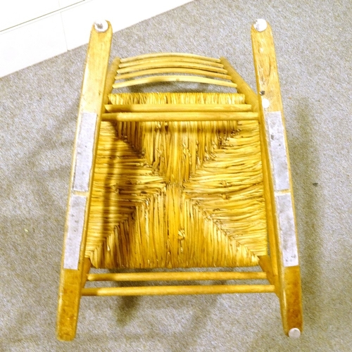 138 - An Arts and Crafts Cotswold School rocking chair, by Neville Neal, maker's stamp inside rear leg