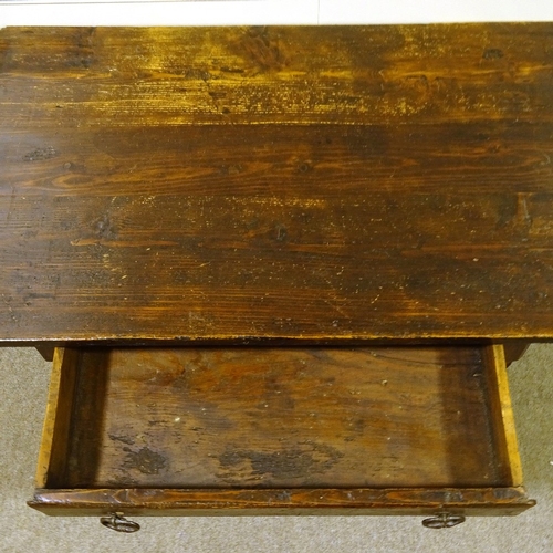 159 - A Georgian stained pine refectory style kitchen table, with turned supports, and single frieze drawe... 