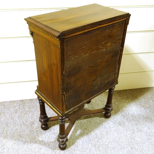 341 - A 19th century parcel gilt mahogany 3-drawer side table of small size, with corner columns, turned s... 